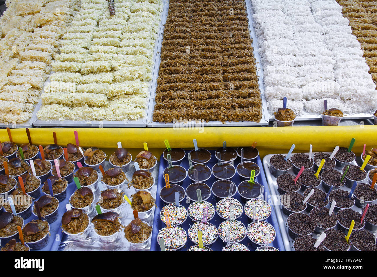 Banking with variety of coconut sweets and brigadiers sale Stock Photo