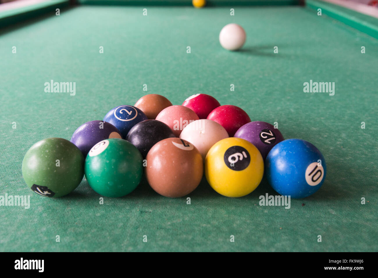 Pool table ready for play in maroon community bar - Ribeira Valley Stock Photo