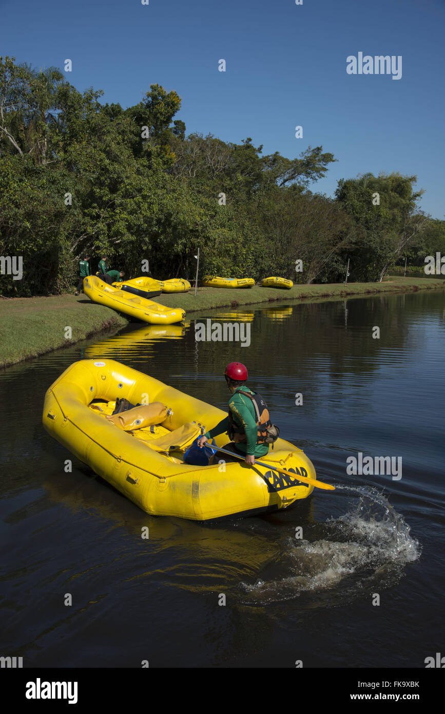 Preparation of inflatable boats for tourists training in lake Stock Photo