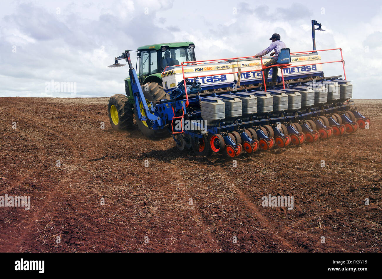 Drill of grains performing soybean planting in the prepared land Stock