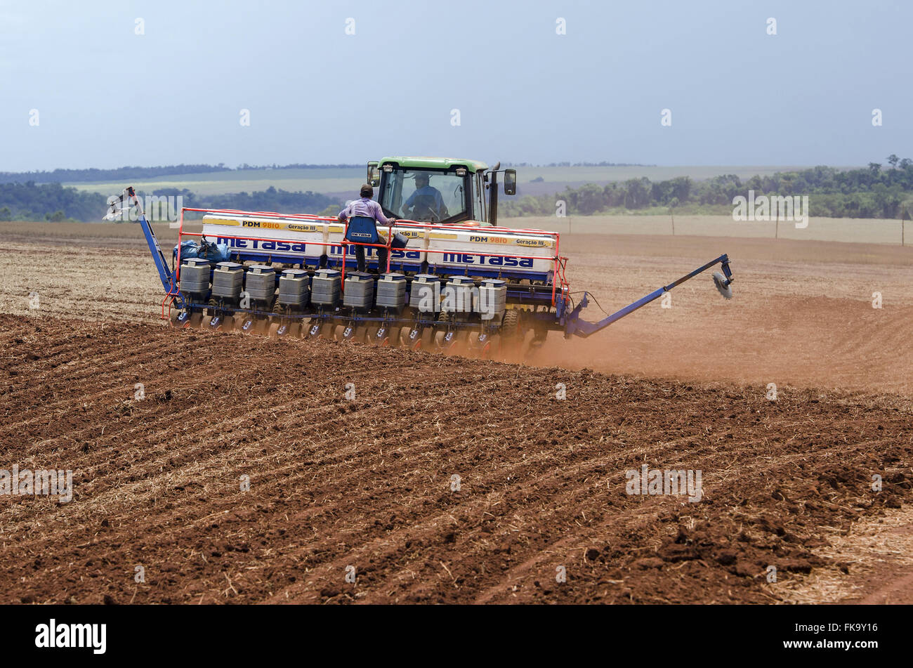 Drill of grains performing soybean planting in the prepared land Stock