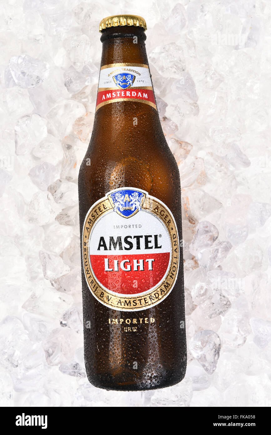Amstel Light Bottle on a bed of ice. Vertical format. Stock Photo