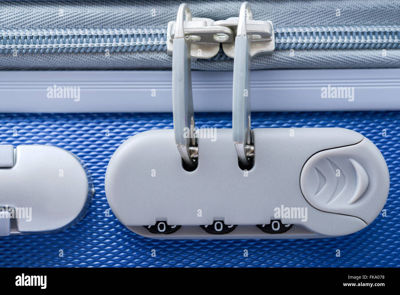 Combination lock for zipper on a suitcase Stock Photo - Alamy