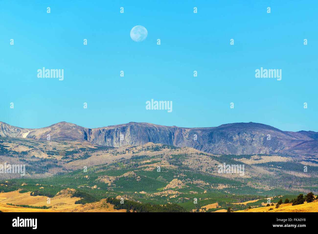 Early morning view of the moon over the Bighorn mountains near Buffalo, Wyoming Stock Photo