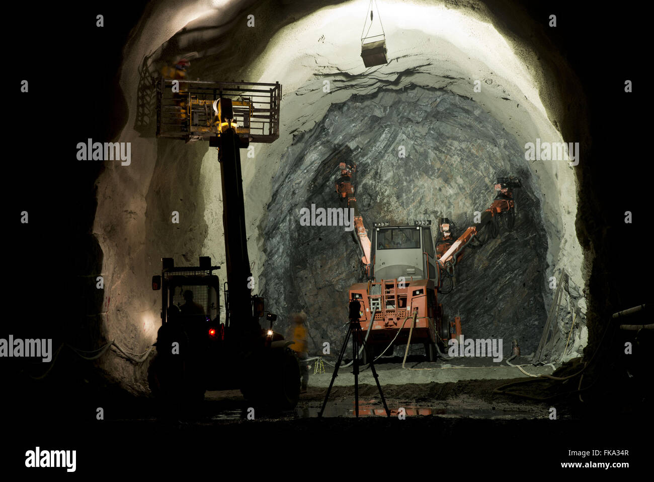 Drilling drilling rock for placing dynamite - Tunel Cuncas II Stock Photo