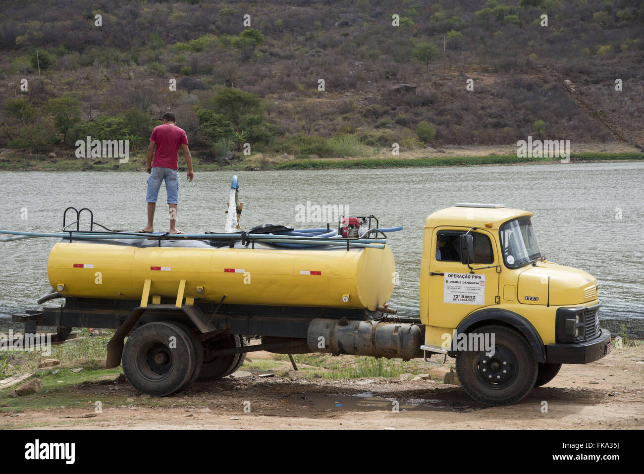 Water truck filling up water in Acude waterfall to supply villages of