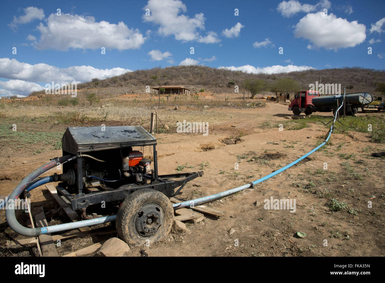 Water truck filling up water in Acude waterfall to supply villages of