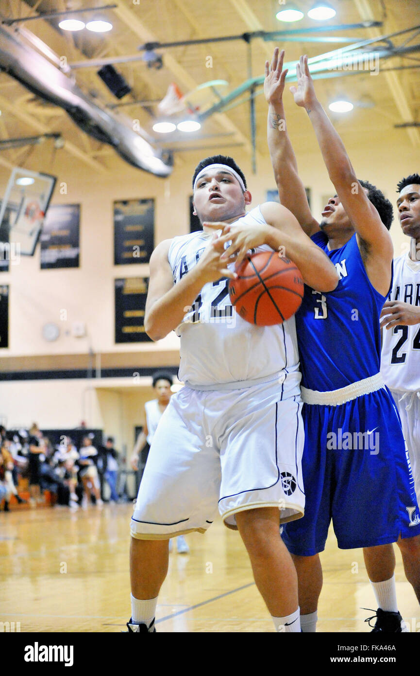 In fighting for an offensive rebound a player has the ball deflect