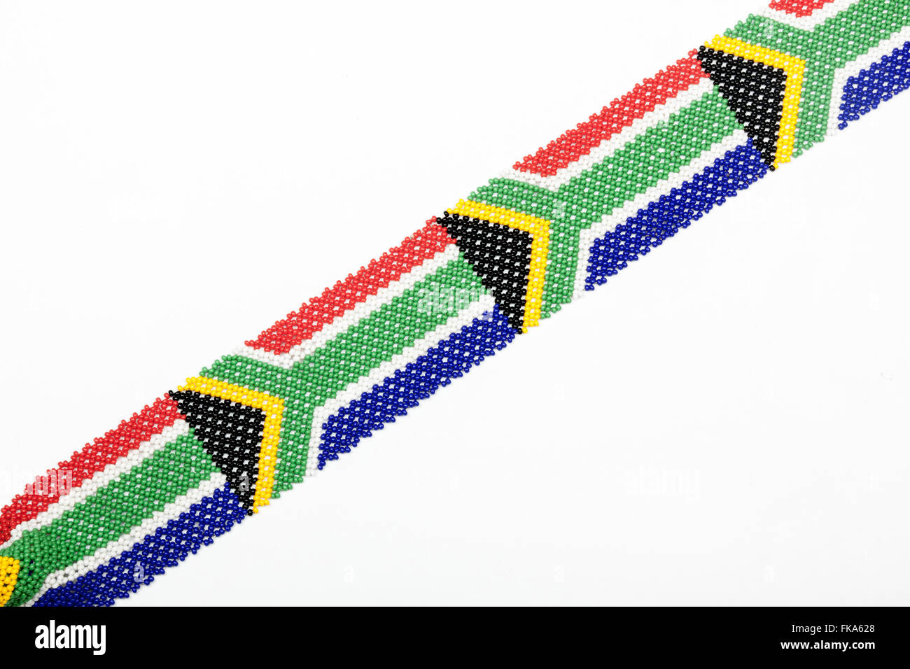 Close up Studio shot Zulu beads threaded in the colors of the South African flag on white Stock Photo