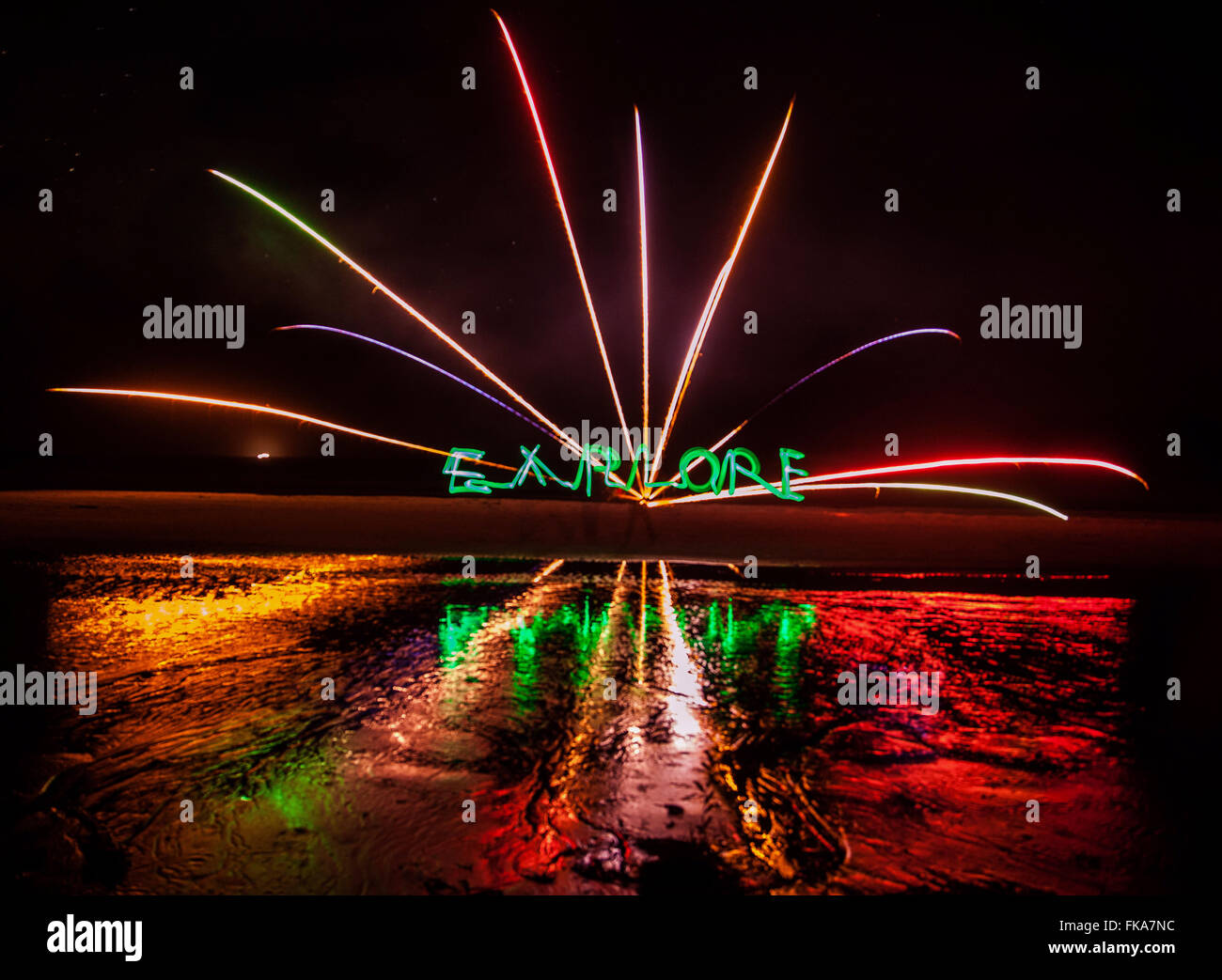 Night time capture, painting on a long exposure, with light and fireworks Stock Photo