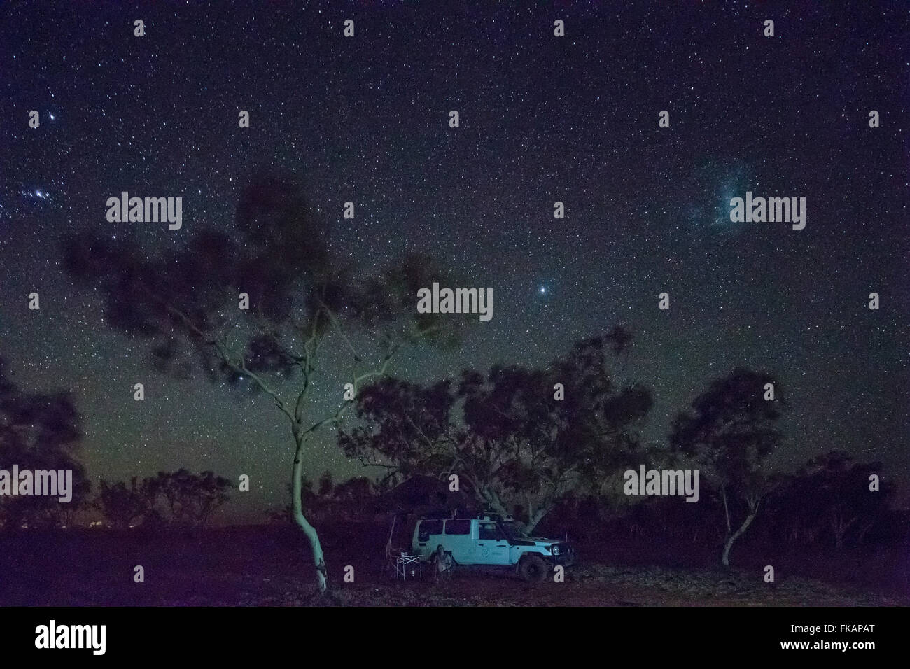camping under the night sky over the Pilbarra, Western Australia Stock Photo