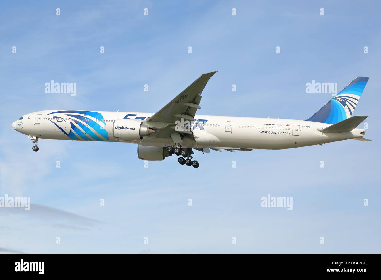 Egyptair Boeing 777-300ER SU-GDR landing at London Heathrow Airport, UK Stock Photo