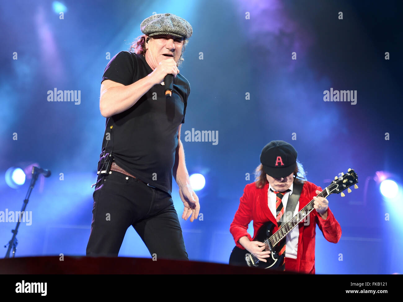 Berlin, Germany. 25th June, 2015. Singer Brian Johnson (L) and guitarist Angus Young of Australian rock band AC/DC perform on stage during a concert at the Olympiastadion in Berlin, Germany, 25 June 2015. Photo: Britta Pedersen/dpa/Alamy Live News Stock Photo