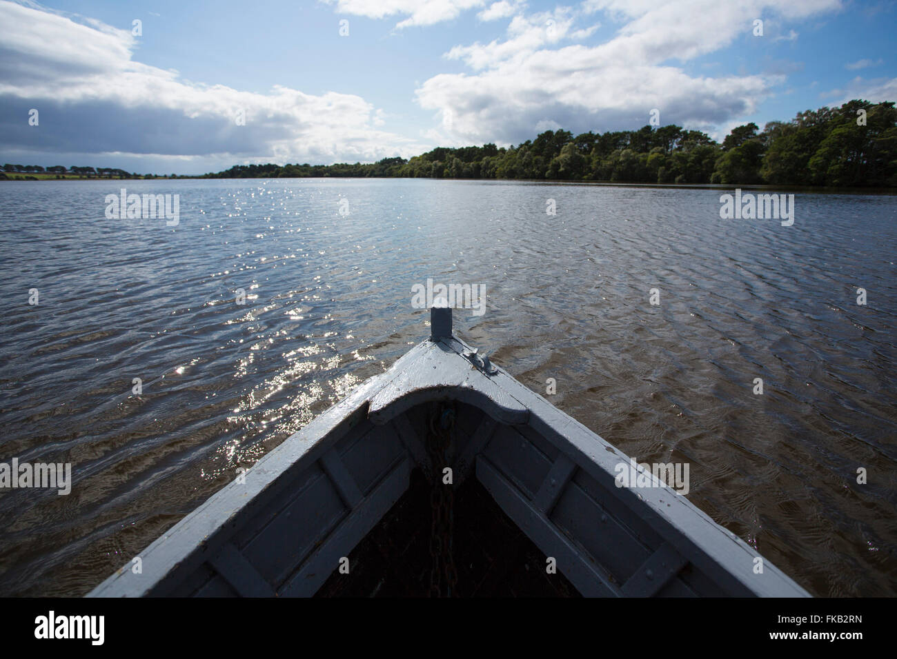 An old rowing boat on a loch in Scotland Stock Photo - Alamy