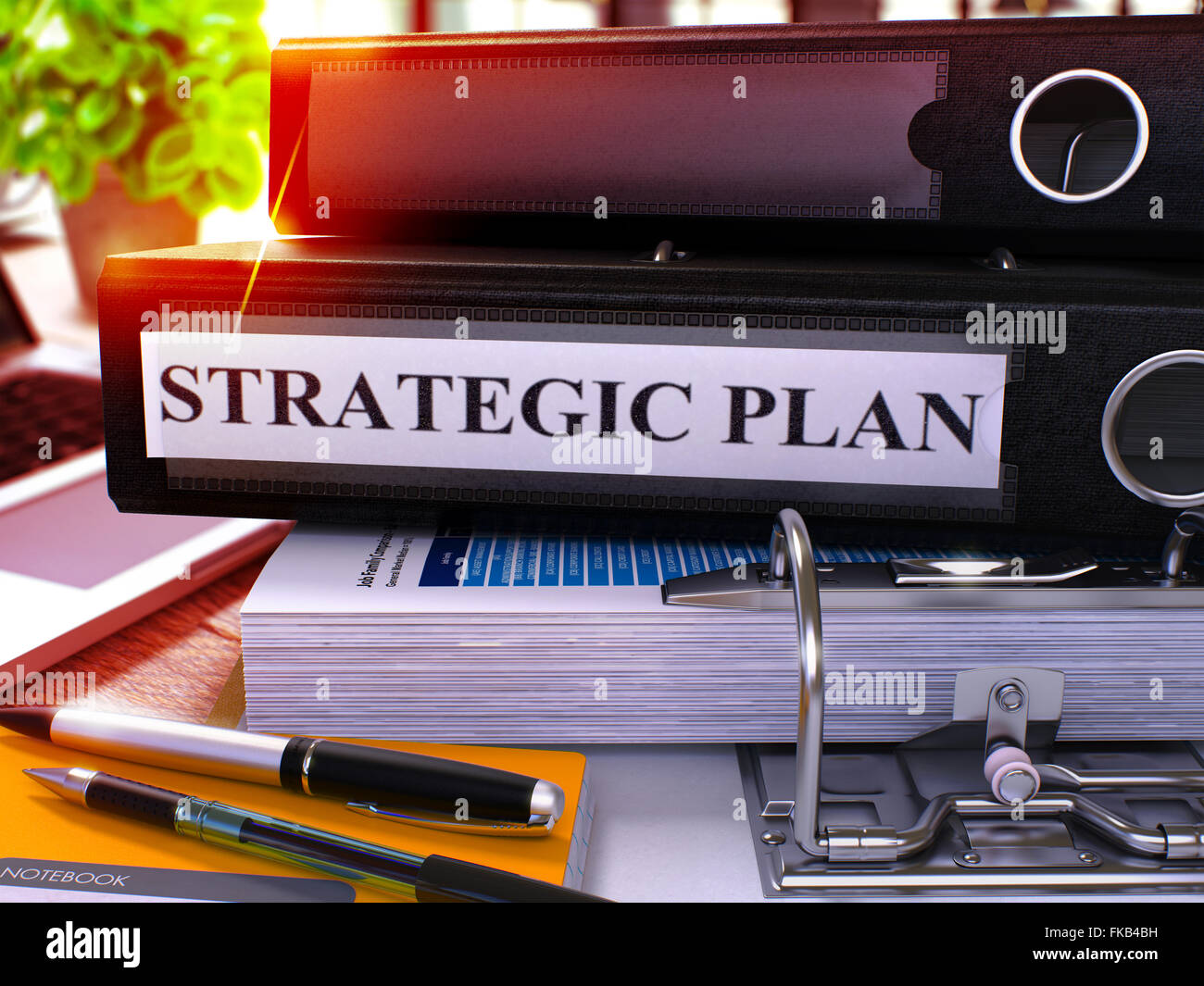 Strategic Plan on Black Ring Binder. Blurred, Toned Image. Stock Photo