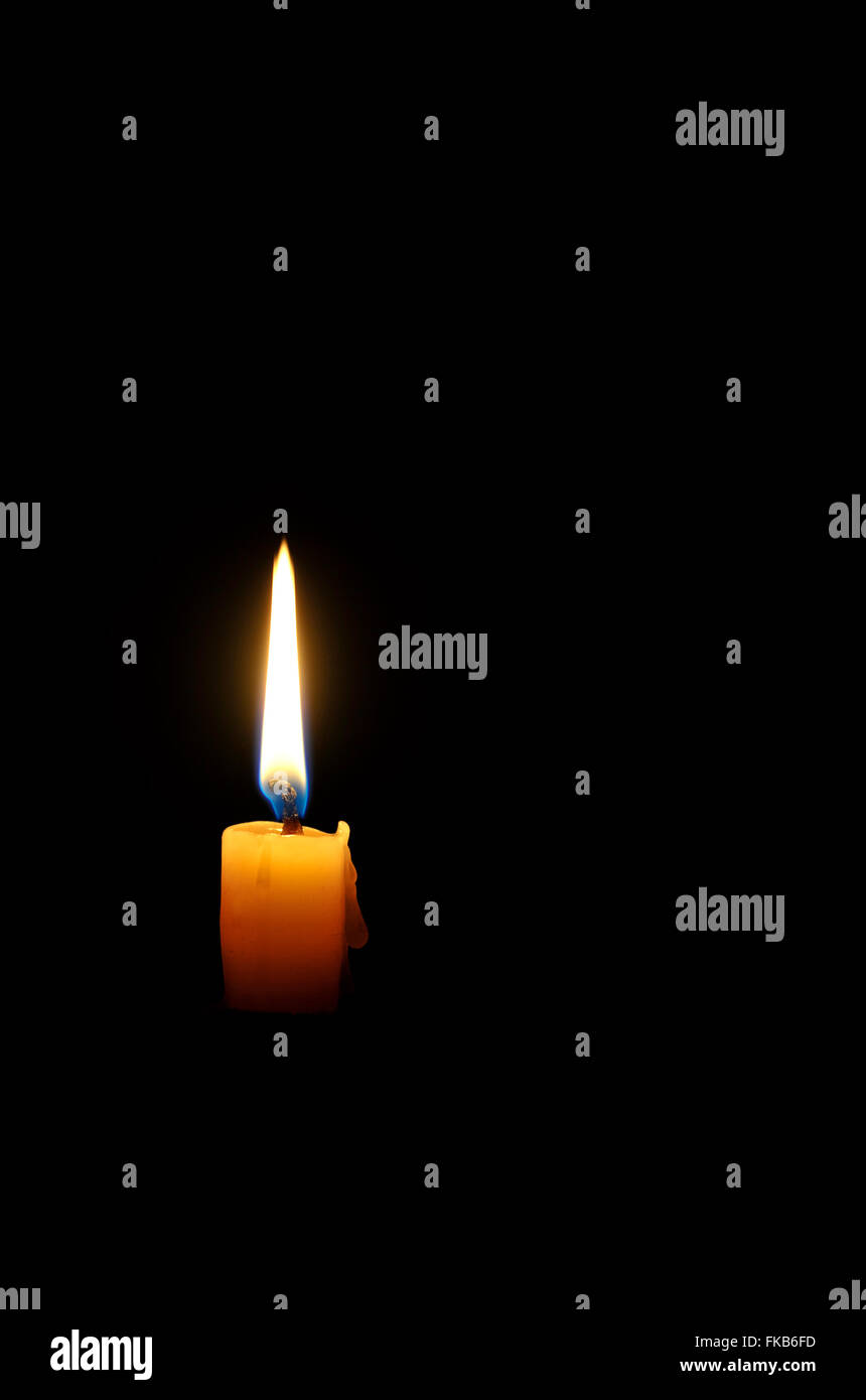 https://c8.alamy.com/comp/FKB6FD/single-wax-candle-flame-burning-in-darkness-FKB6FD.jpg