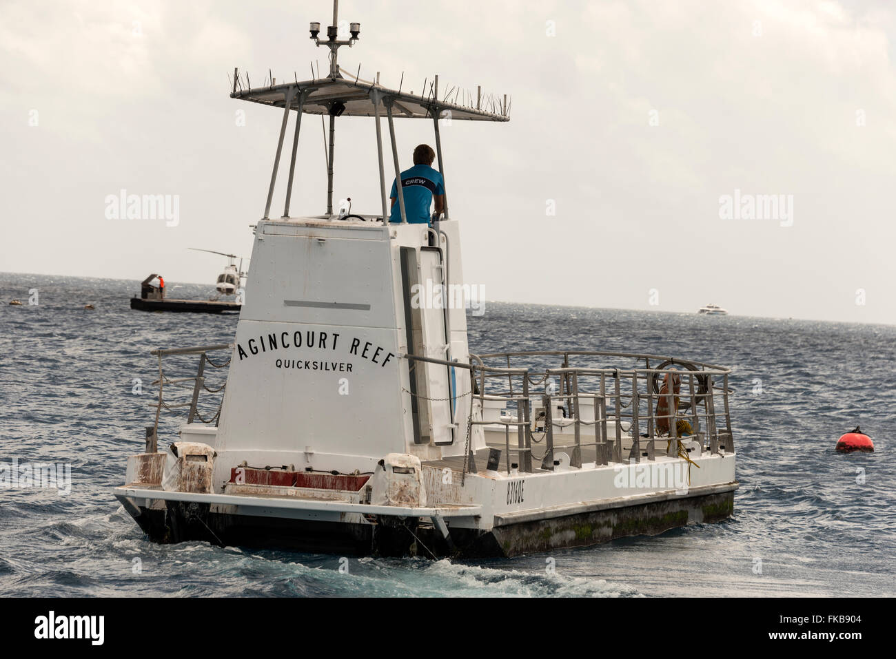A  mini-submarine, taking tourists on a few minutes tour around the reefs to see the coral and tropical fish in the Agincourt R Stock Photo