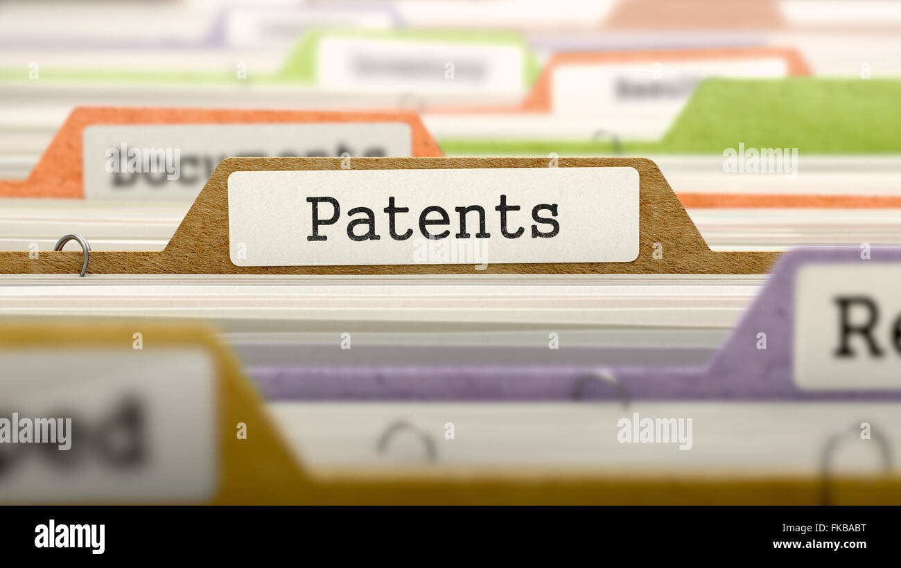Patents Concept on File Label. Stock Photo