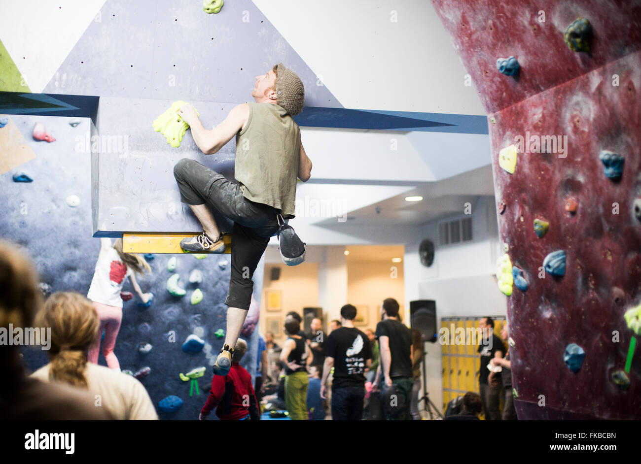 Climbers take part in a bouldering competition at The Climbing Academy