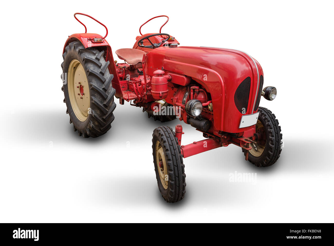red tractor isolated on white background with shadows Stock Photo - Alamy