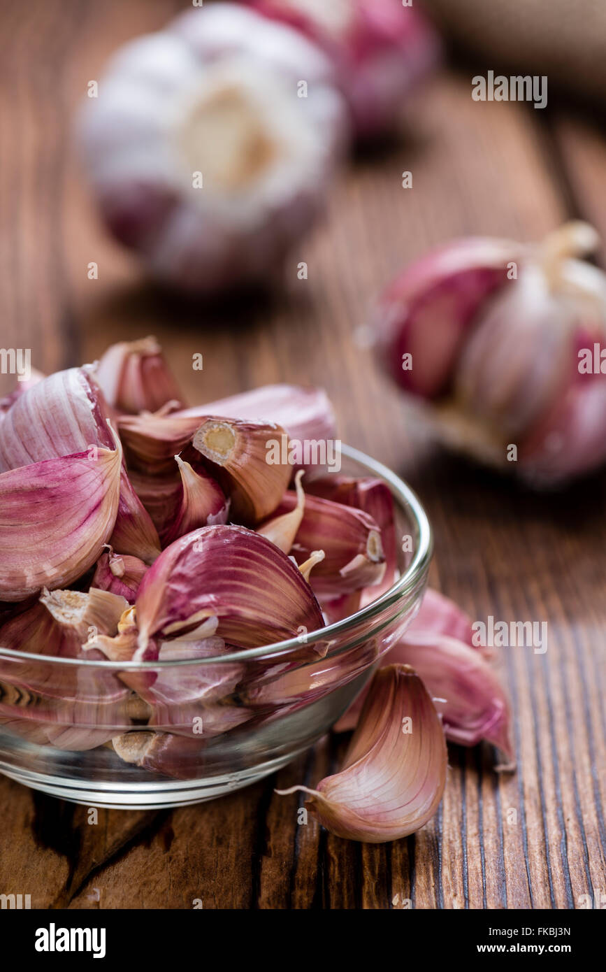 Fresh Garlic on an old and dark rustic wooden table Stock Photo - Alamy