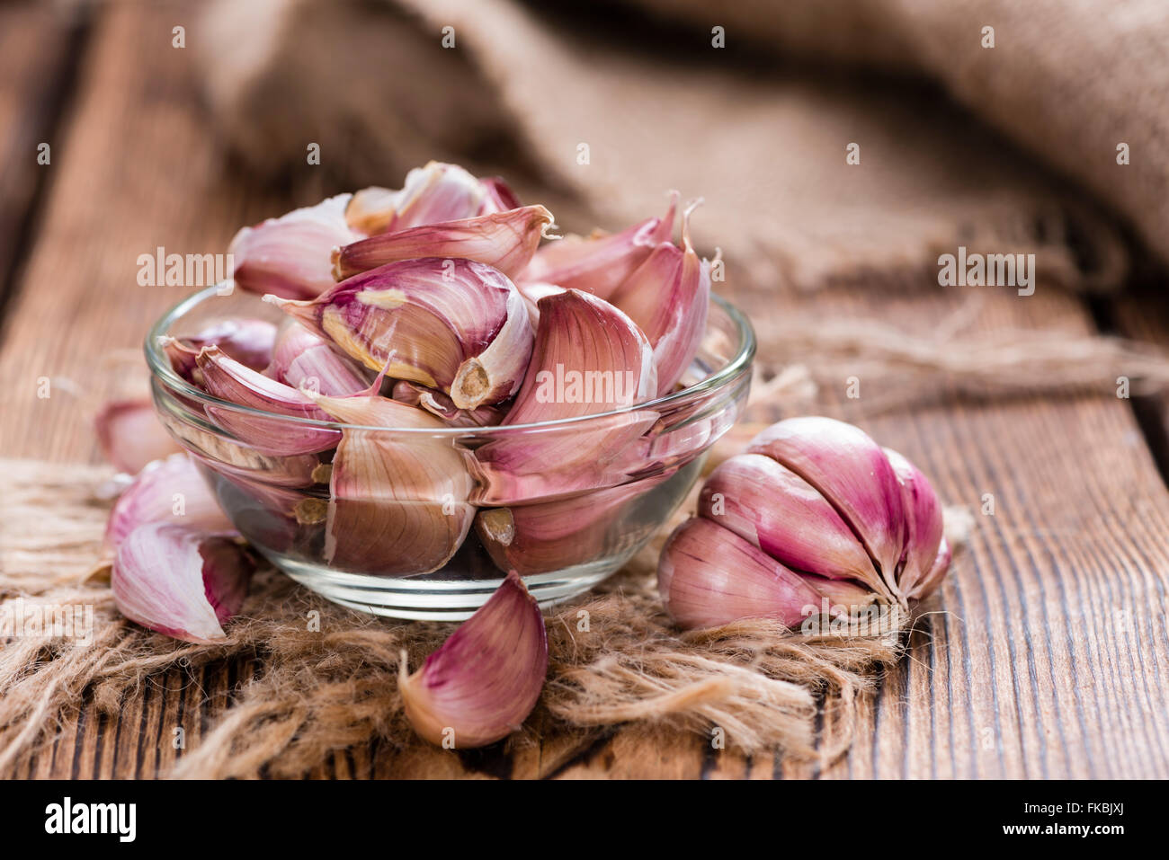 Fresh Garlic on an old and dark rustic wooden table Stock Photo - Alamy