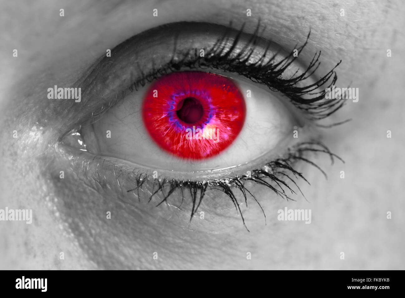 Eye with red iris looks at viewer concept macro Stock Photo Alamy