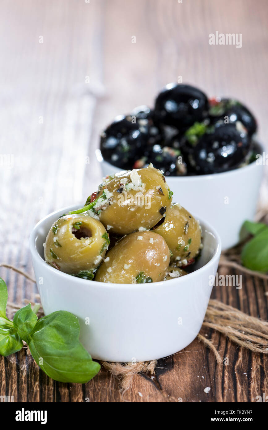 Mixed Olives (black and green ones) marinated with garlic and fresh