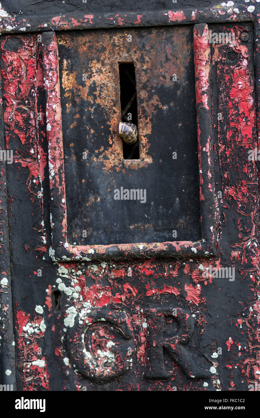 snail mail,british, broken, communication, day, decommissioned, drystone, GR. faded, letter, letterbox, lock, mail, old, Stock Photo