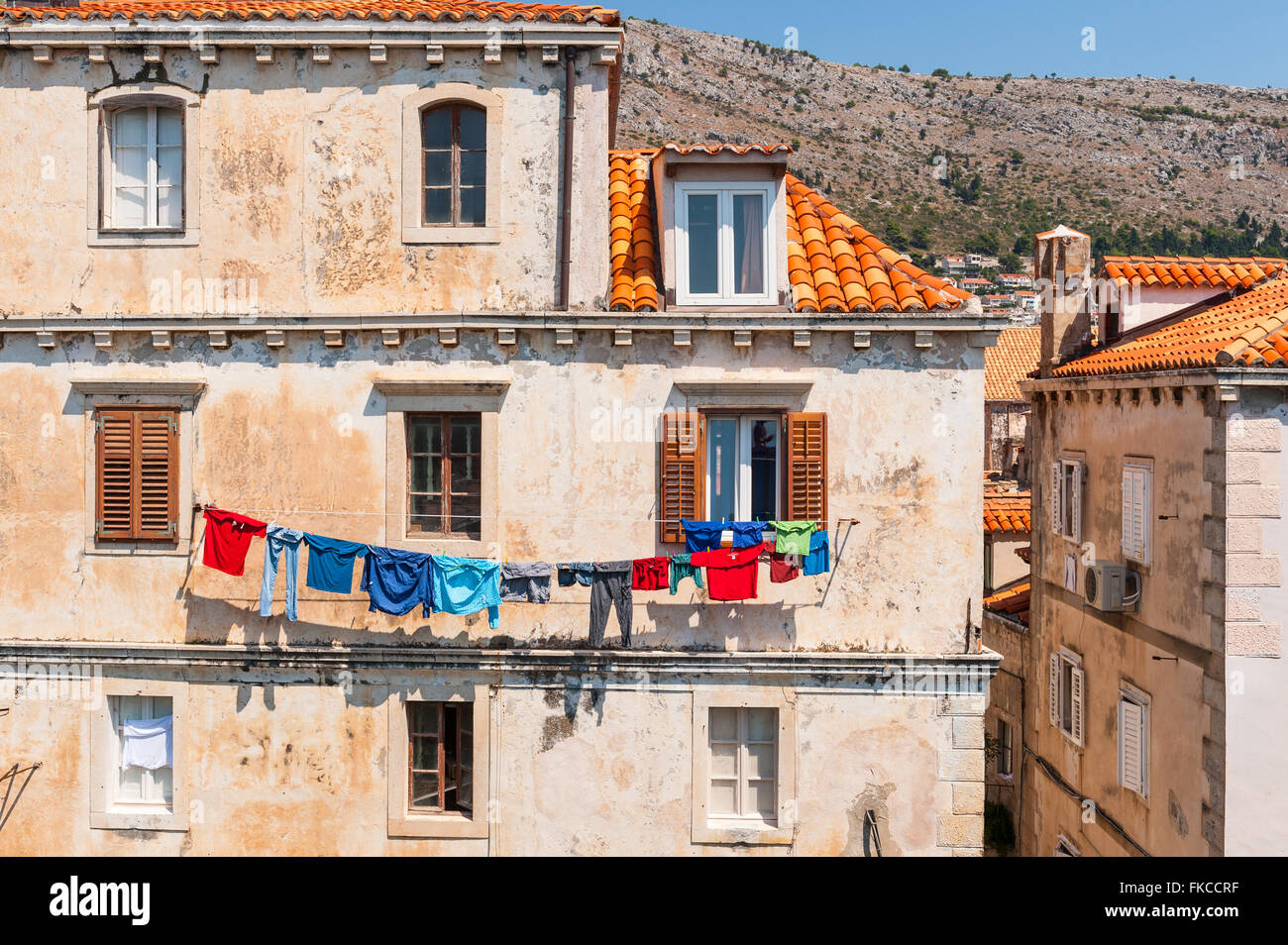 Colourful clothes hanging from clothes washing line outside a house in Dubrovnik, Dalmatia,Croatia, Europe. Stock Photo