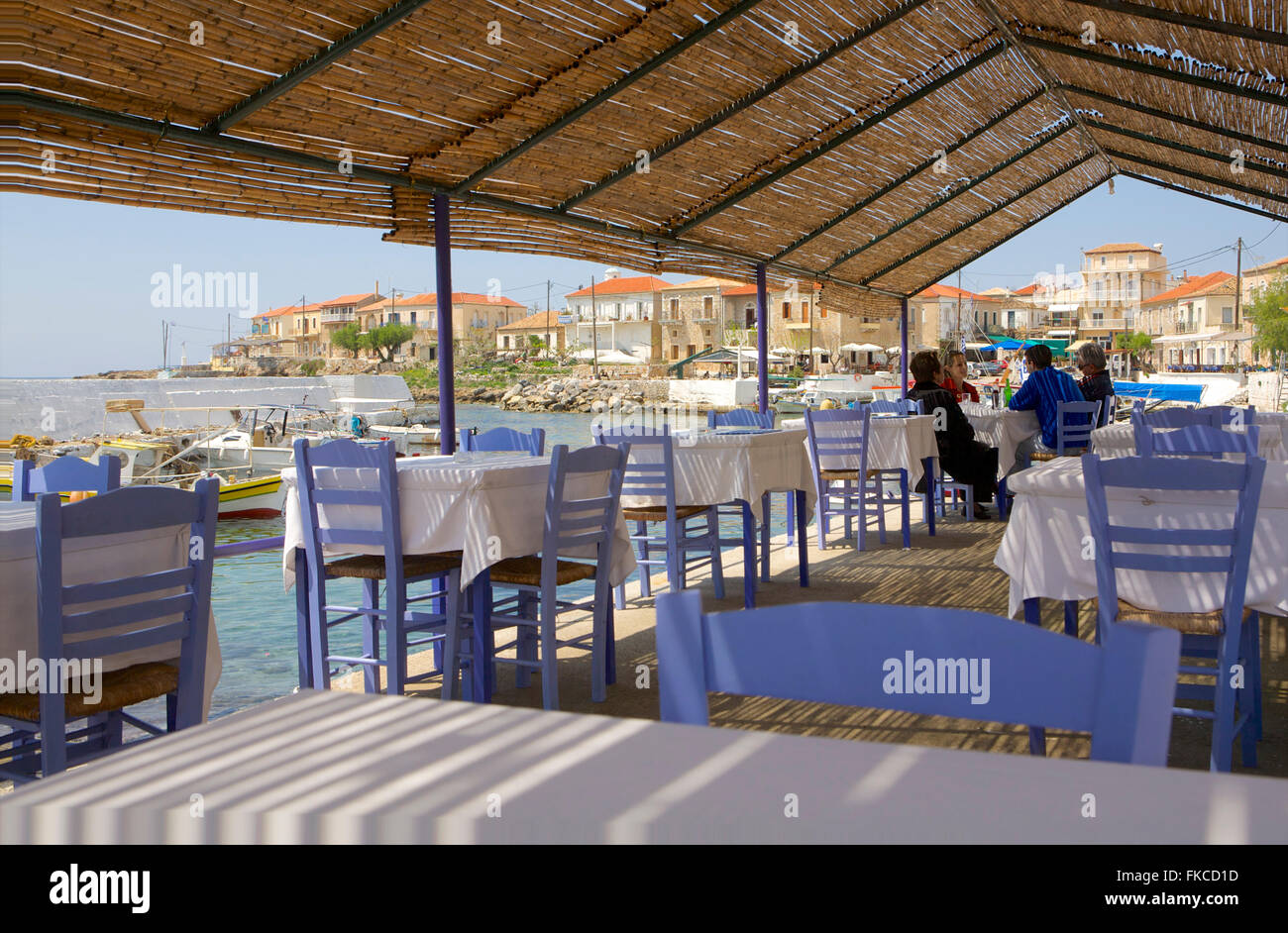People sitting in a taverna (a small Greek restaurant) Stock Photo