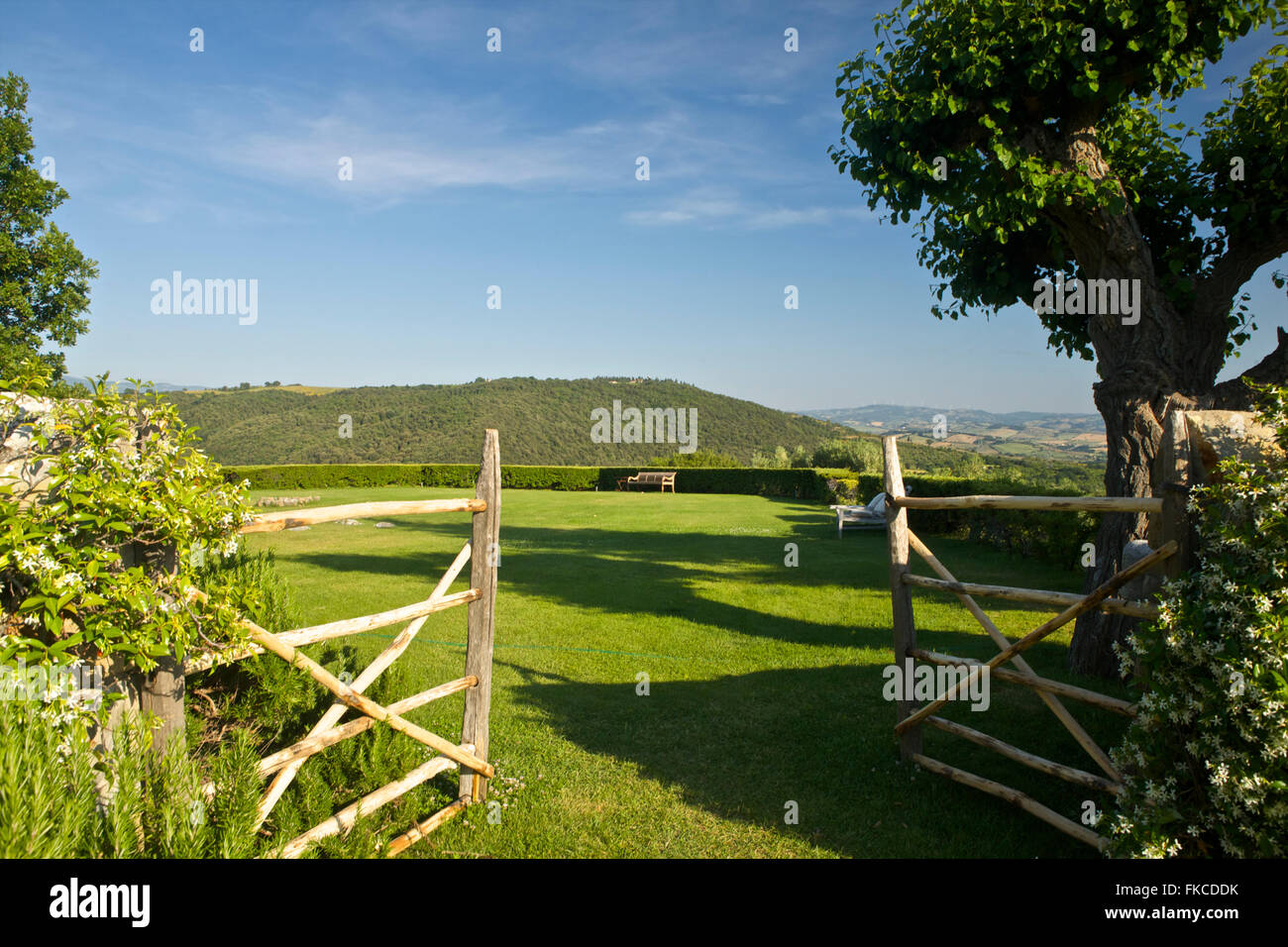 Gates onto lawn at Villa Di Vicarello, Tuscany, Italy Stock Photo