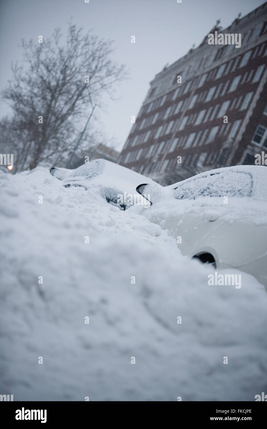 Cars buried in snow from a major snow storm in Kansas City, Missouri