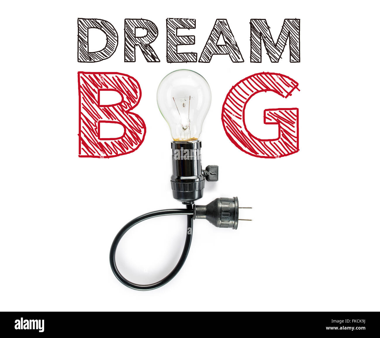 dream big phrase and light bulb, hand writing inspirational positive Stock Photo