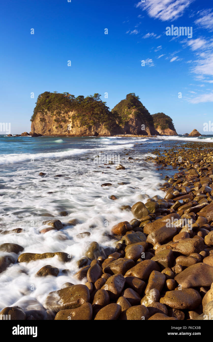 The Sanshiro-Jima islands (三四郎島) on the rocky coastline of the Izu Peninsula in Japan on a beautiful bright day. Stock Photo