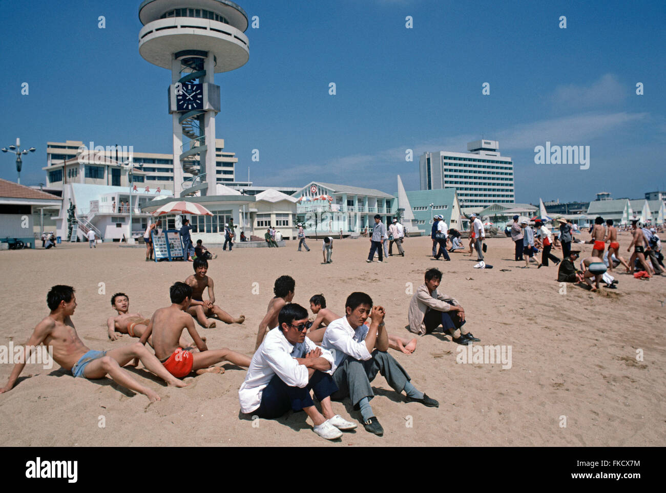 Chinese bathers and holiday makers on Qingdao beach, Shandong Province, China Stock Photo