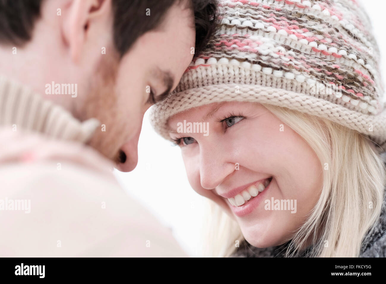 Couple standing face to face Stock Photo