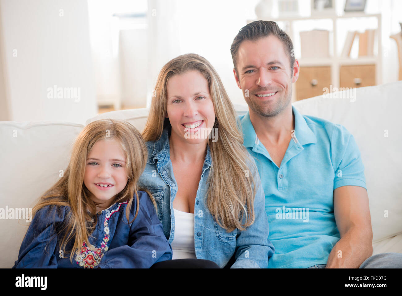 Portrait of family with one child (6-7) Stock Photo