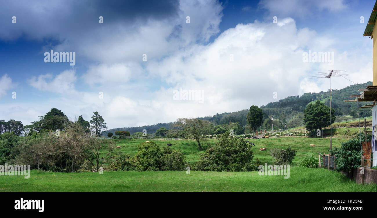 Rural landscape against cloudy sky, Costa Rica Stock Photo