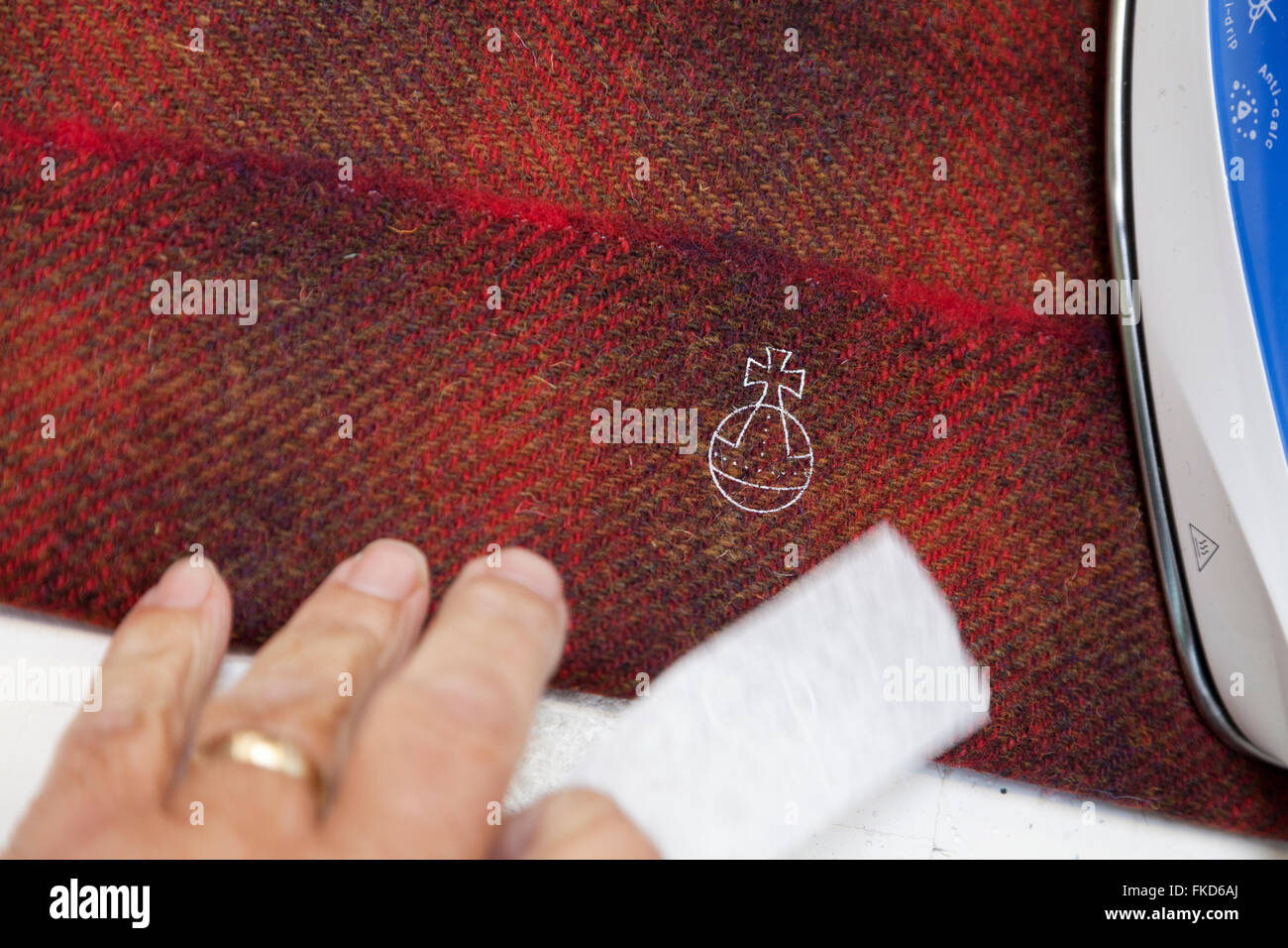 Harris Tweed orb trademark symbol on fabric Stock Photo