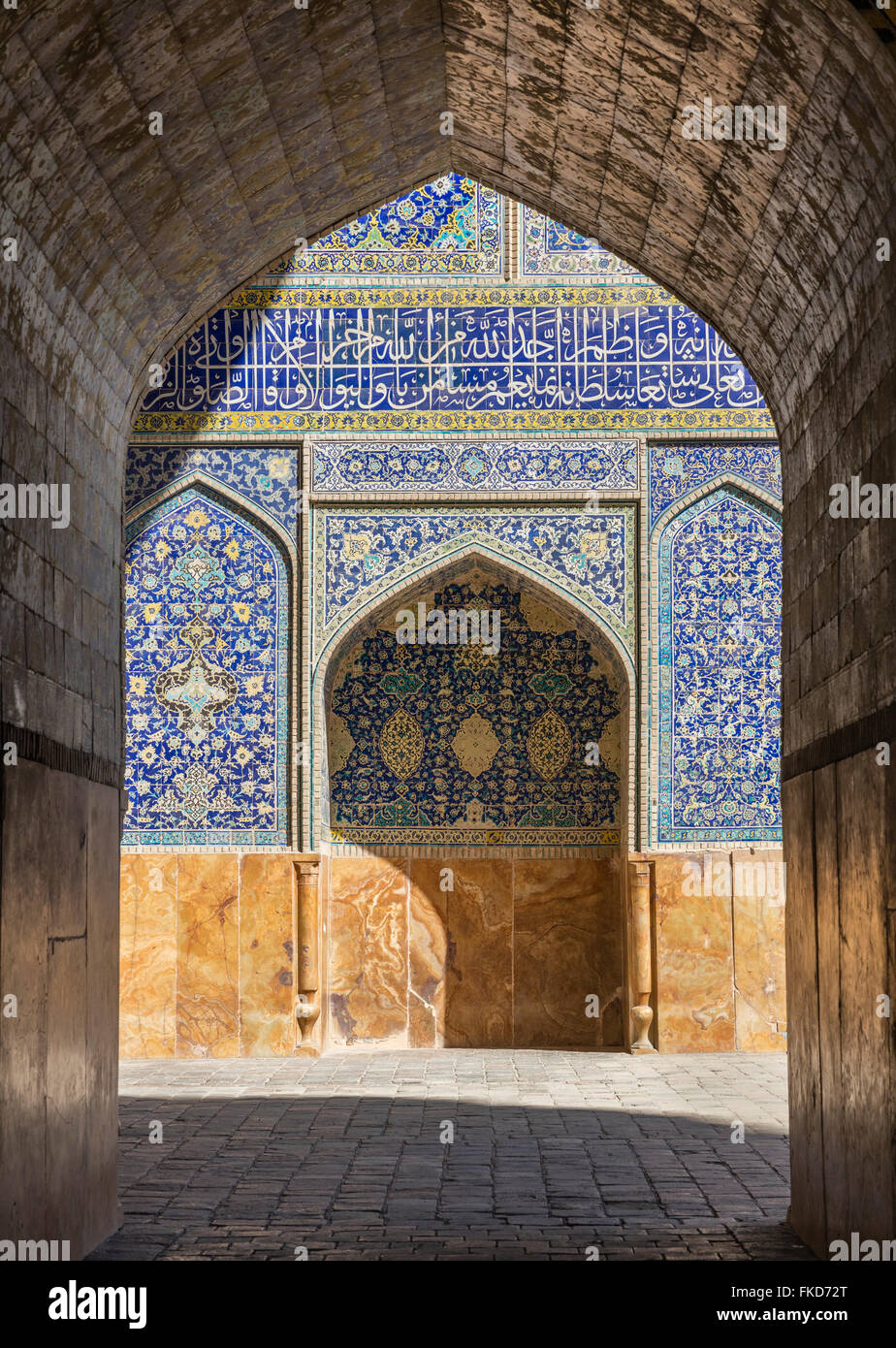 Covered passageway and mosaic tile decoration at Masjed-e Imam, Maydan-e Imam Square, Isfahan, Iran Stock Photo