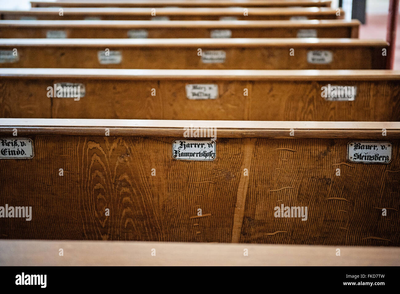 Historic church pew in Bavaria reserved seats Stock Photo Alamy