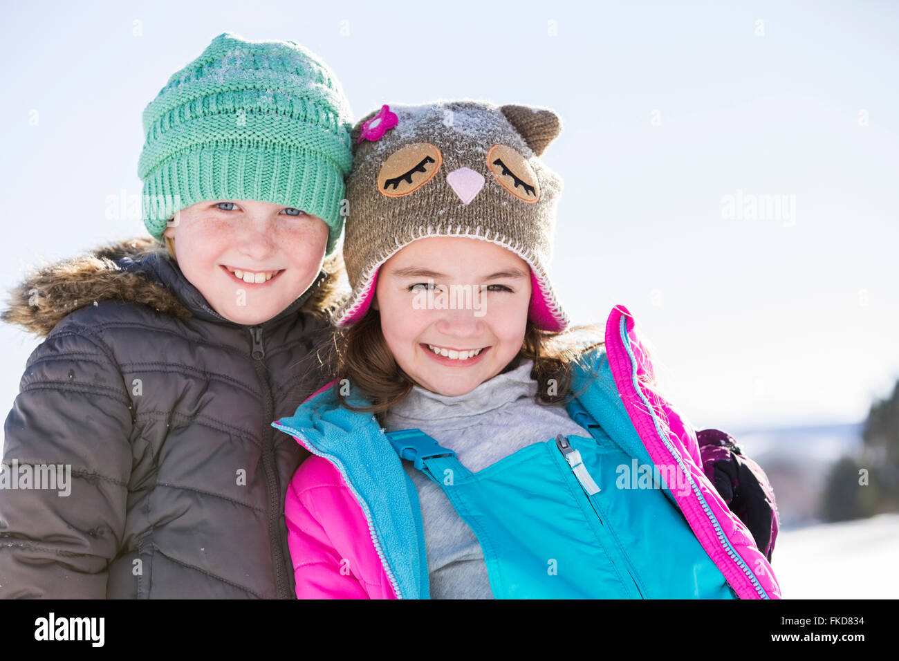 Portrait of children (8-9, 10-11) in winter clothing Stock Photo