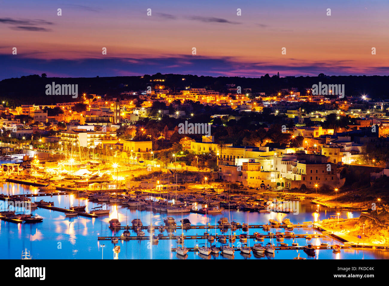 Illuminated townscape of Santa Maria di Leuca with marina in foreground Stock Photo