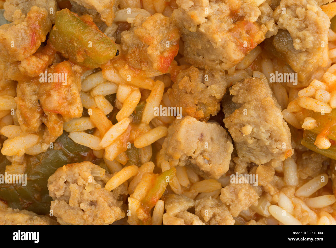 A very close view of rice, green peppers and chunks of beef. Stock Photo