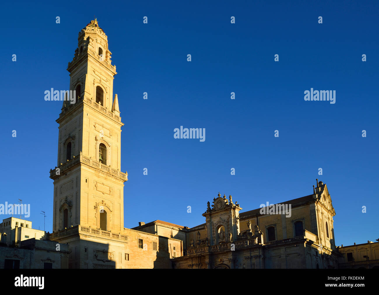 Bell tower and cathedral against clear sky Stock Photo