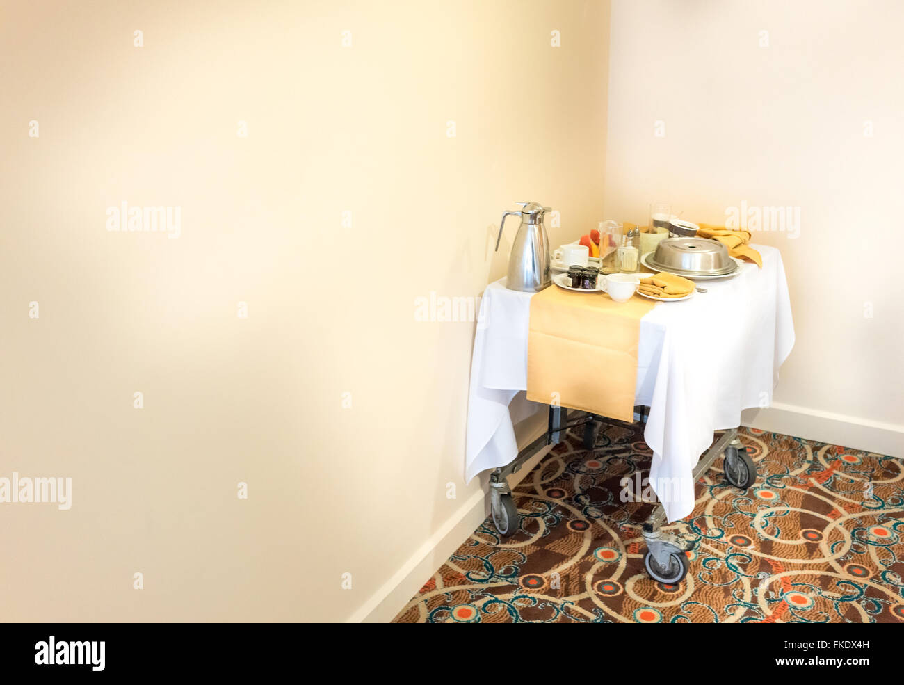 Food serving cart with breakfast in the corner of hotel room, Trinidad, Trinidad And Tobago Stock Photo