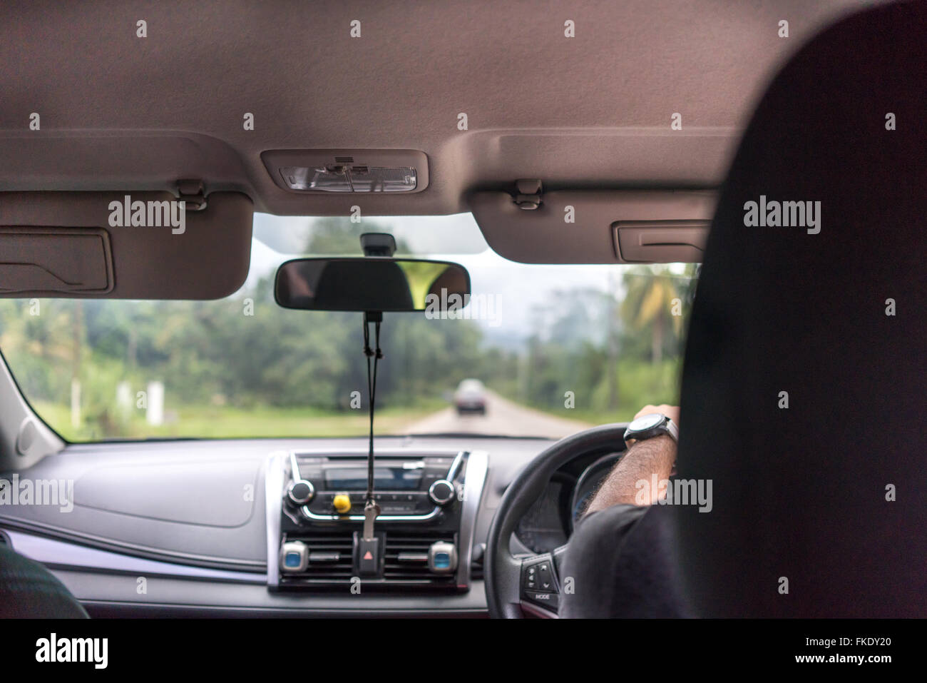Man driving car on road, Trinidad, Trinidad And Tobago Stock Photo Alamy