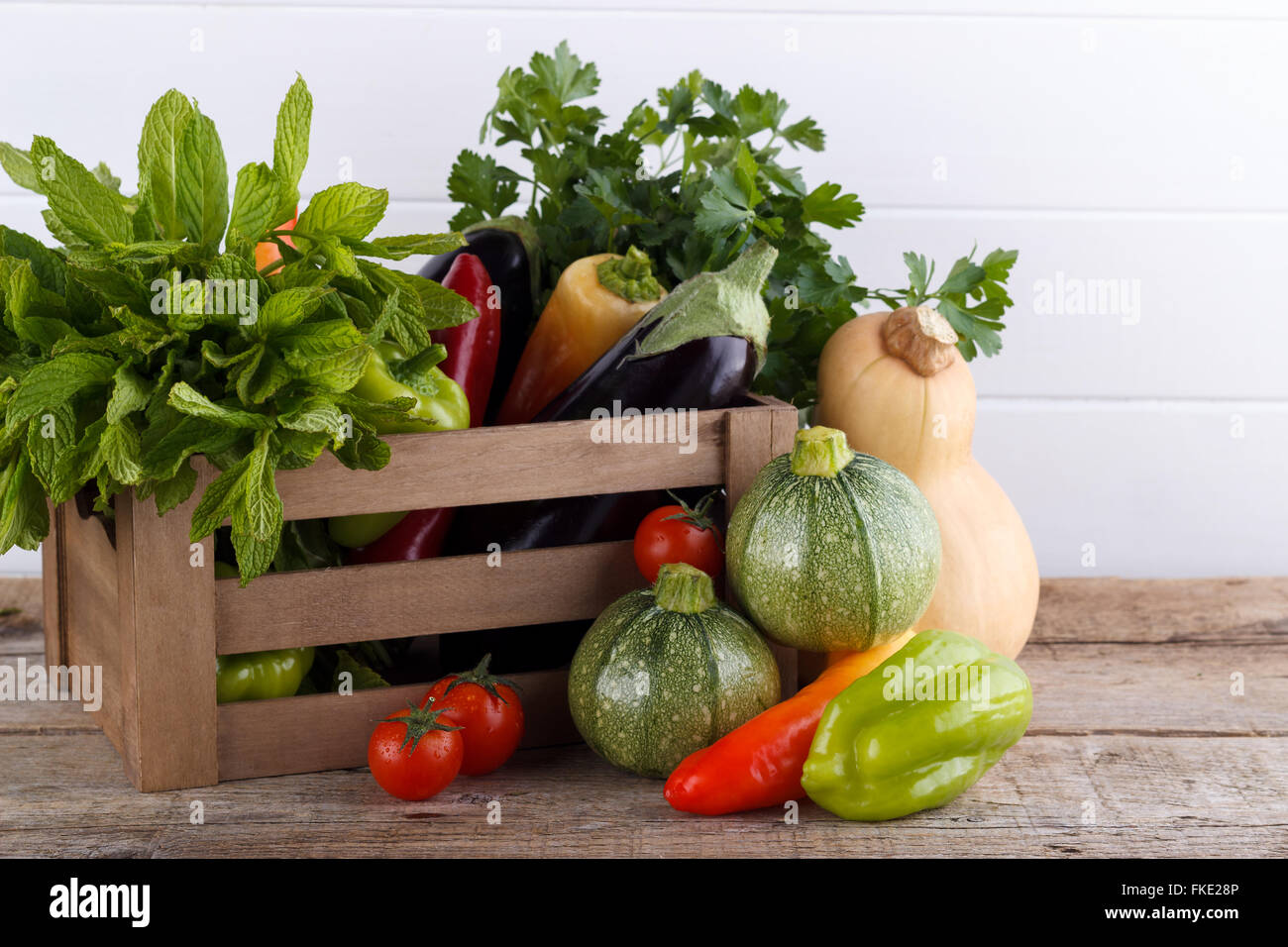 Fresh vegetables in wooden box, food background Stock Photo - Alamy
