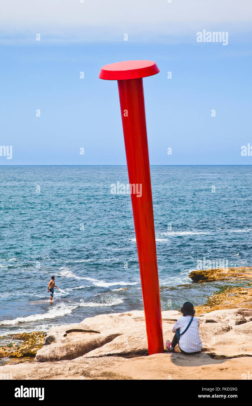 Sculpture by the Sea, staged along Sydney's spectacular Bondi to Tamarama coastal walk. 'The Nail', sculpture by Juan Pablo Pint Stock Photo